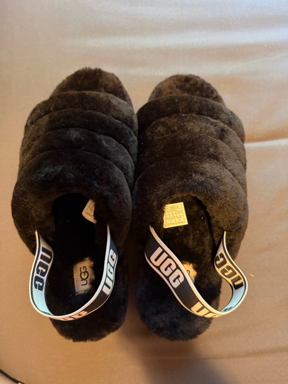 UGG Black Fluffy Slide Sandals with Branded Back Strap. Brand new, never worn.